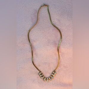 Lovely Short Gold And Diamond necklace.